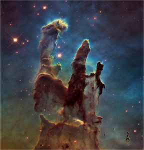 تصویر ۶: سحابی عقاب، محل تولد ستاره‌ها از گاز‌ها و غبار‌های میان‌ستاره‌ای